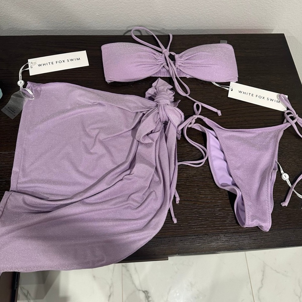 White fox bathing suit set 
New with tags size small